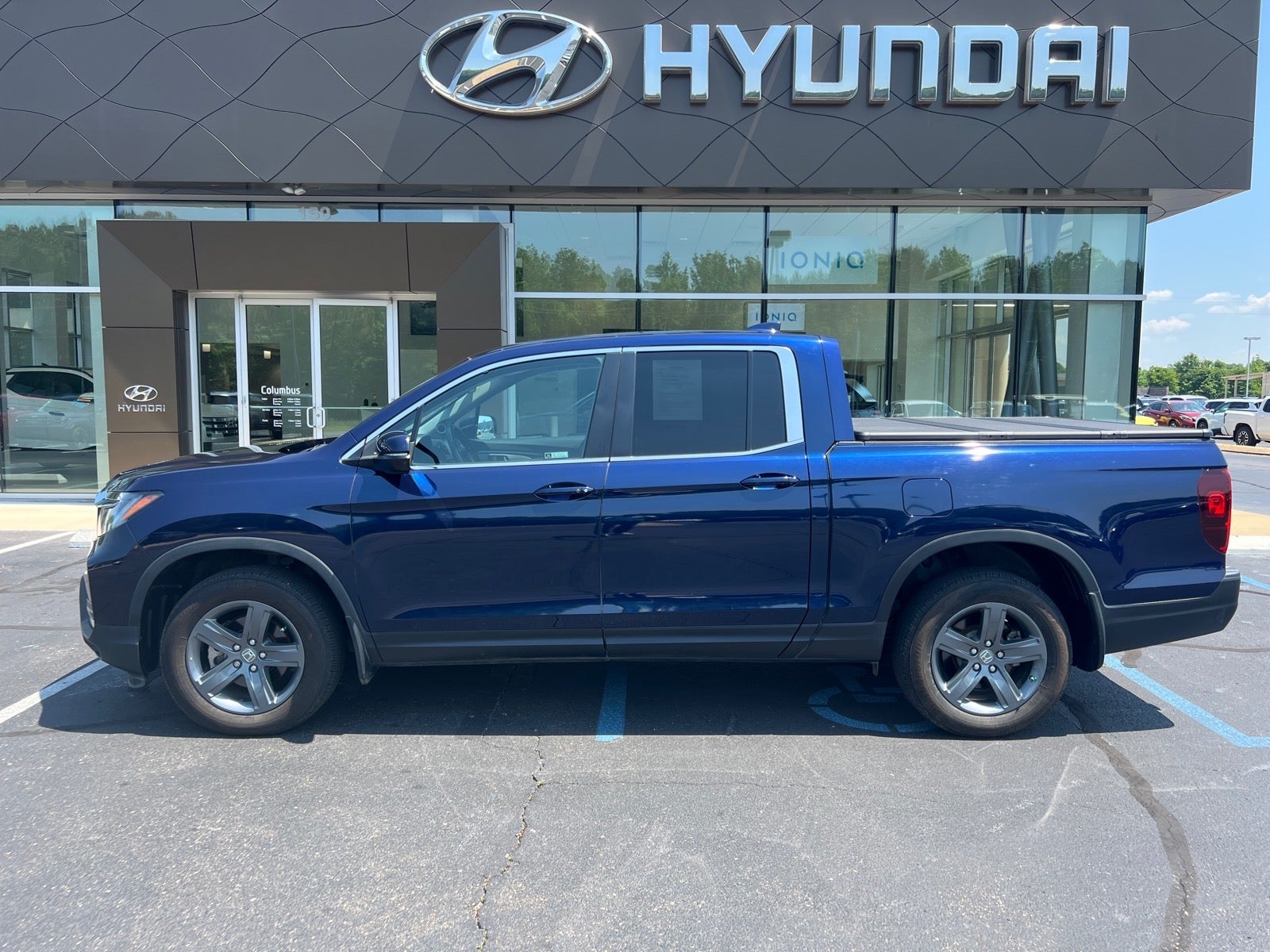 2021 Honda Ridgeline RTL in Blue — front three-quarter view