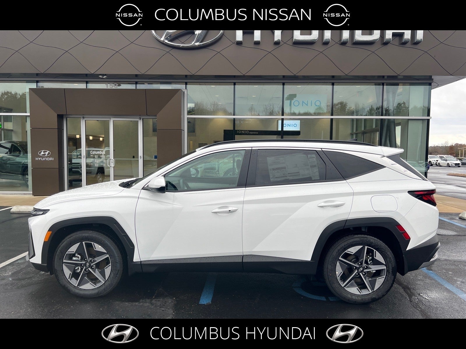 2026 Hyundai TUCSON SEL in White — front three-quarter view