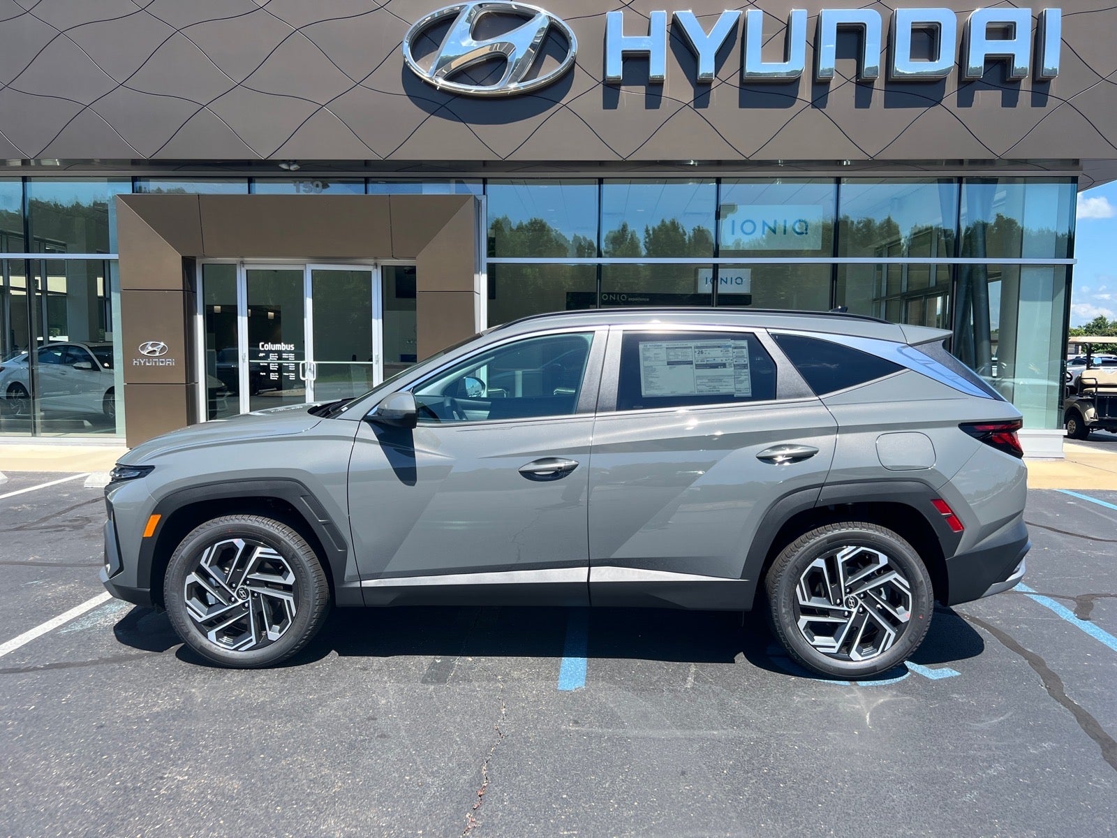 2026 Hyundai TUCSON SEL Plus in Gray — front three-quarter view
